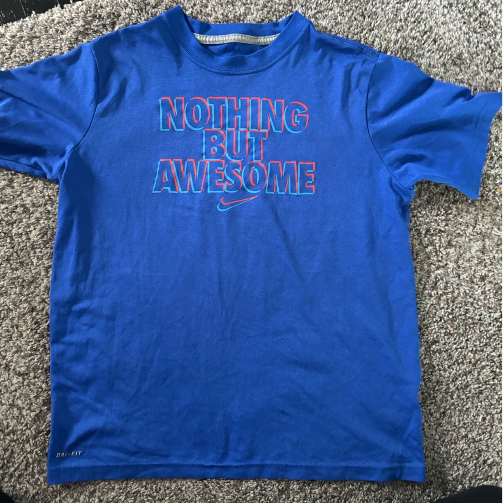 Blue Nike shirt